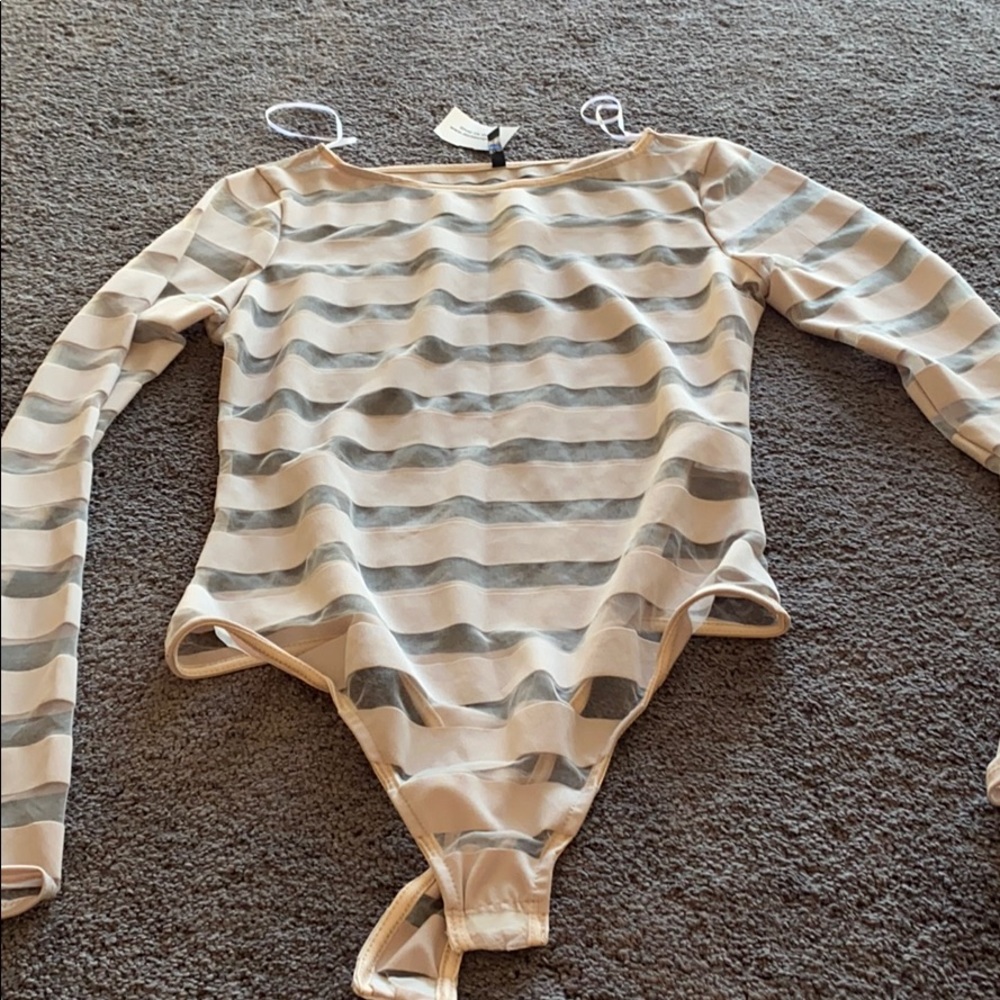 SOLD ❌ !!  Pale Pink Bodysuit with See-Thru lines